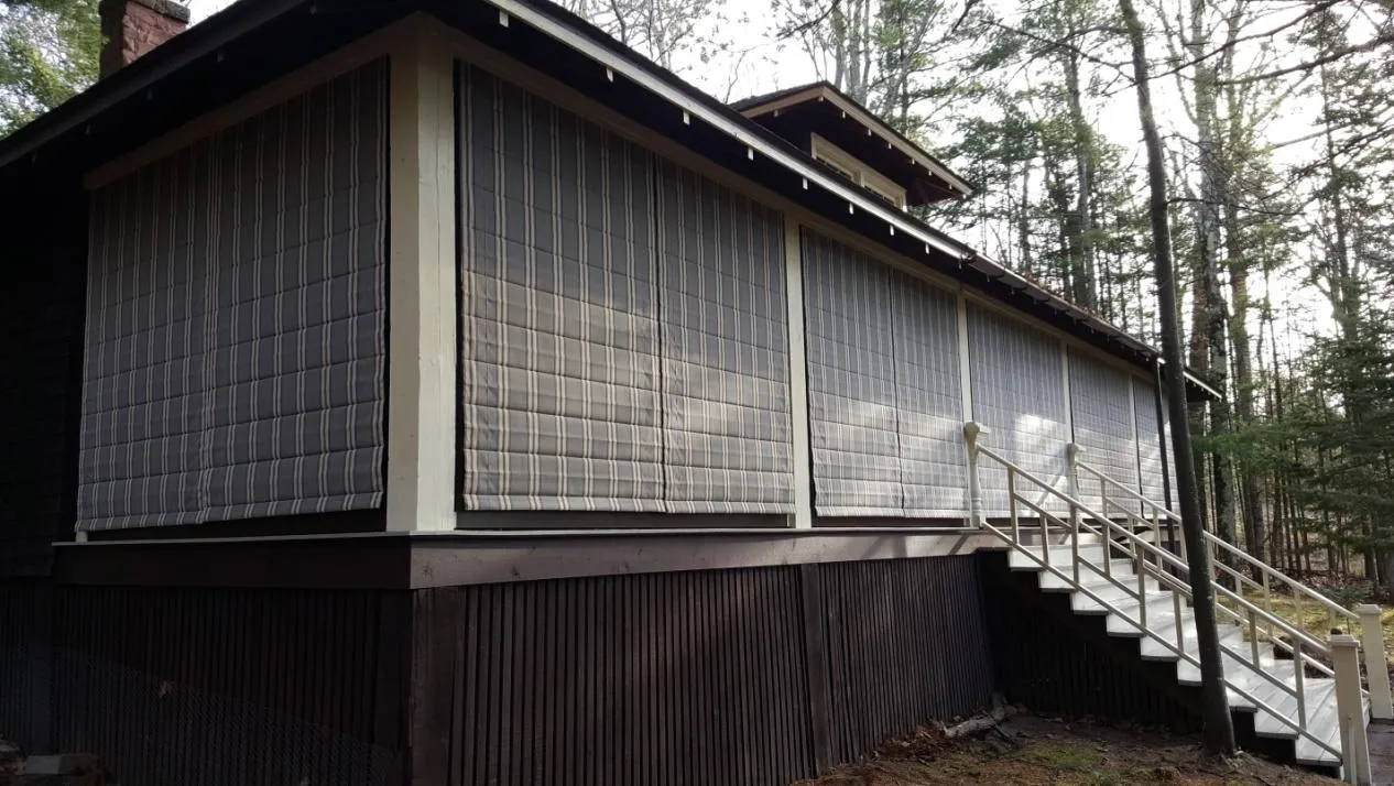 image9 All closed up and protected. With the bottom wood framing, the shades where made a little short to give the porch complete protection while allowing room for motorization at a later date. Two years later we went back and motorized the shades.