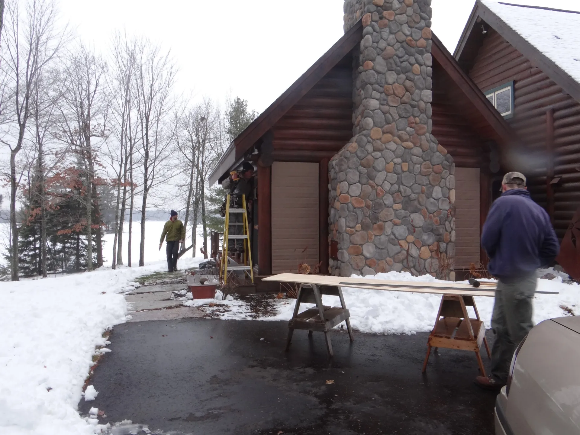 027 Sjostrom crew working in the snow